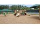 Community playground area with slides and lots of room for the to play at 6317 Benbrooke Overlook Nw, Acworth, GA 30101