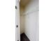 Small closet with wire shelving and neutral patterned carpet at 7775 Sudbury Cir, Covington, GA 30014