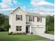Charming two-story home with neutral siding, dark shutters, and a well-manicured front lawn at 7775 Sudbury Cir, Covington, GA 30014
