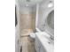 Clean bathroom featuring a vanity sink, a toilet, and a tiled walk-in shower with a built in bench at 2060 Devore Sw Dr, Marietta, GA 30008