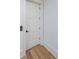 Interior door with trim and hardwood floors at 2837 Darlington Run, Duluth, GA 30097