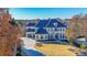 Beautiful two-story home with a circular driveway and professionally landscaped front yard at 2837 Darlington Run, Duluth, GA 30097