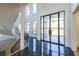 Spacious foyer boasting marble floors, soaring ceilings, and an elegant winding staircase at 2837 Darlington Run, Duluth, GA 30097