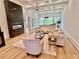 Elegant living room showcasing a fireplace, neutral furniture, hardwood floors, and coffered ceilings at 2837 Darlington Run, Duluth, GA 30097