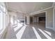 Bright, open living room featuring marble floors, fireplace and many windows at 2837 Darlington Run, Duluth, GA 30097