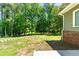 Expansive backyard with lush greenery and natural views at 4826 Dean Sw Ln, Lilburn, GA 30047