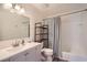 Cozy bathroom features a combined shower and tub, along with a vanity with ample space for storage at 4826 Dean Sw Ln, Lilburn, GA 30047