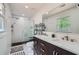 Modern bathroom with double sinks, a spacious shower, and stylish tile accents at 4826 Dean Sw Ln, Lilburn, GA 30047