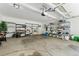 Spacious garage featuring ample shelving, storage space, and concrete flooring at 4826 Dean Sw Ln, Lilburn, GA 30047