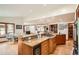 Large kitchen island with granite counters, stainless appliances and space for entertaining at 4826 Dean Sw Ln, Lilburn, GA 30047