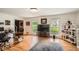 Bright living room with hardwood floors, large windows, and neutral decor at 4826 Dean Sw Ln, Lilburn, GA 30047