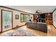 Cozy living room with hardwood floors, fireplace and built-in shelves offering comfort and charm at 4826 Dean Sw Ln, Lilburn, GA 30047