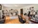 Bright living room with a neutral color palette, hardwood floors and white shelving at 4826 Dean Sw Ln, Lilburn, GA 30047