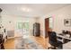 Comfortable office space with a view into another room at 4826 Dean Sw Ln, Lilburn, GA 30047