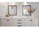 Bathroom featuring double sinks, a white vanity, and modern fixtures at 260 N. 18Th St # 10326, Atlanta, GA 30363