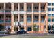 Exterior view of a brick building with multiple windows and street parking at 260 N. 18Th St # 10326, Atlanta, GA 30363
