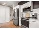 Well-equipped kitchen boasting stainless steel appliances and ample cabinetry for storage at 260 N. 18Th St # 10326, Atlanta, GA 30363