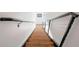 Modern stairway features wood treads and a cable railing system at 260 N. 18Th St # 10326, Atlanta, GA 30363