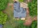 Overhead aerial shot showing the home's roof and backyard patio at 30 Stonewall Dr, Covington, GA 30016