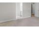 Cozy bedroom featuring soft carpeting and access to multiple bathrooms at 30 Stonewall Dr, Covington, GA 30016