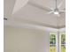 Bright bedroom with a trey ceiling and multiple windows providing ample natural light at 30 Stonewall Dr, Covington, GA 30016