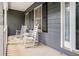 Cozy front porch with rocking chairs offers a relaxing outdoor space at 325 N Oakland Cir, Mcdonough, GA 30253