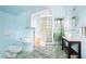 Bathroom features unique sink and shower, surrounded by unique tiling and colors at 364 Brooks Ne Ave, Atlanta, GA 30307