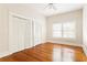 Bedroom features hardwood floors, natural light, and closet space at 364 Brooks Ne Ave, Atlanta, GA 30307