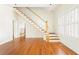 Bright foyer with hardwood floors, staircase, and ample natural light at 364 Brooks Ne Ave, Atlanta, GA 30307