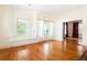 Spacious living room featuring hardwood floors, natural light, and classic architectural details at 364 Brooks Ne Ave, Atlanta, GA 30307