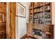 Wooden bar area with storage and shelves with hardwood flooring at 2440 Peachtree Nw Rd # 9, Atlanta, GA 30305