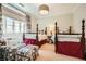 Charming bedroom with floral accents, two twin beds, and a large window with natural light at 2440 Peachtree Nw Rd # 9, Atlanta, GA 30305