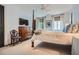 Comfortable bedroom with four-poster bed, wood floors, and bright windows at 2440 Peachtree Nw Rd # 9, Atlanta, GA 30305
