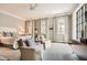 Bright bedroom with neutral tones, a plush rug, elegant decor, and natural light, creating a serene atmosphere at 2440 Peachtree Nw Rd # 9, Atlanta, GA 30305