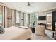Serene main bedroom featuring soft colors, large windows, and a sitting area at 2440 Peachtree Nw Rd # 9, Atlanta, GA 30305
