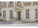 Close up shot of the front entrance of the townhome showing the detailed stonework at 2440 Peachtree Nw Rd # 9, Atlanta, GA 30305