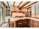 Bright kitchen features marble countertops, brick accent walls, and modern appliances at 2440 Peachtree Nw Rd # 9, Atlanta, GA 30305