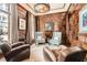 Comfortable living room featuring wood-paneled walls and elegant furnishings at 2440 Peachtree Nw Rd # 9, Atlanta, GA 30305