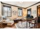 Inviting home office with hardwood floors, natural light, and a classic desk setup at 2440 Peachtree Nw Rd # 9, Atlanta, GA 30305