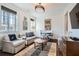 Bright sitting room with large windows, comfortable seating, and stylish decor at 2440 Peachtree Nw Rd # 9, Atlanta, GA 30305