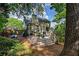 Beautiful back exterior featuring a multi-level deck with a hot tub and ample space for lounging at 3004 High Vista Walk, Woodstock, GA 30189