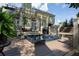 Backyard with hot tub and upper deck, providing an ideal setup for relaxation and outdoor gatherings at 3004 High Vista Walk, Woodstock, GA 30189