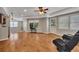 Versatile basement area with hardwood floors, natural light, and space for entertainment at 3004 High Vista Walk, Woodstock, GA 30189