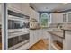 Modern kitchen with stainless steel appliances and ample counter space at 3004 High Vista Walk, Woodstock, GA 30189