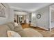 Inviting living room showcasing hardwood floors and a view of the dining area at 3004 High Vista Walk, Woodstock, GA 30189