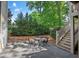 Cozy patio area with outdoor seating, perfect for enjoying alfresco dining and relaxing at 3004 High Vista Walk, Woodstock, GA 30189
