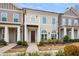 Charming townhouse with a welcoming entrance and a small balcony on the second story at 891 Proctor Oaks Nw St, Atlanta, GA 30318