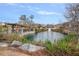 Beautiful pond with fountain, gazebo, and well-maintained landscaping in a tranquil community setting at 891 Proctor Oaks Nw St, Atlanta, GA 30318