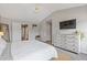 Spacious bedroom featuring a high ceiling, TV, and natural light at 2280 Baker Station Dr, Acworth, GA 30101