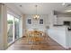 Inviting dining area featuring a sliding glass door and hardwood floors at 2280 Baker Station Dr, Acworth, GA 30101